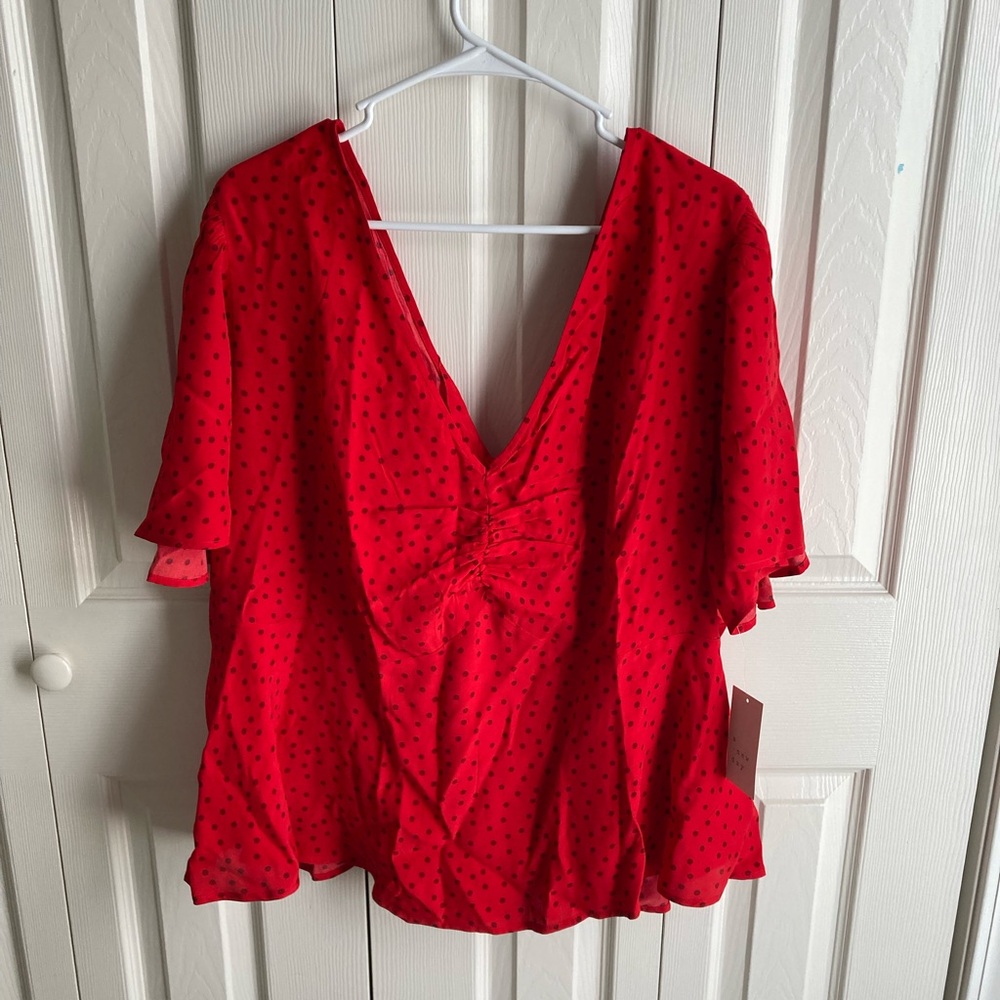 Red polka dot blouse
